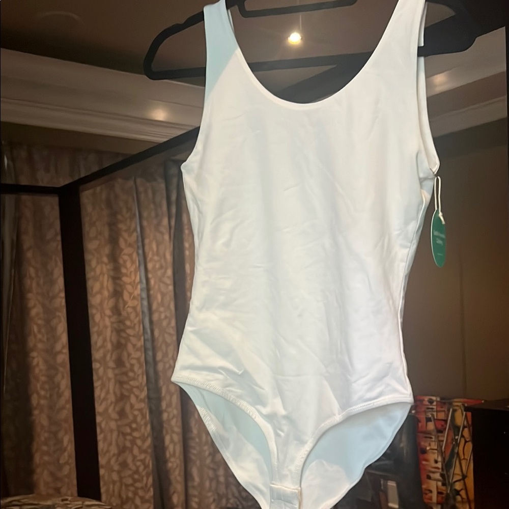 Pact White body suit.